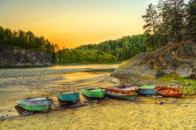 The HDR image of fishermen's berth on Biya river coast in Turochak village